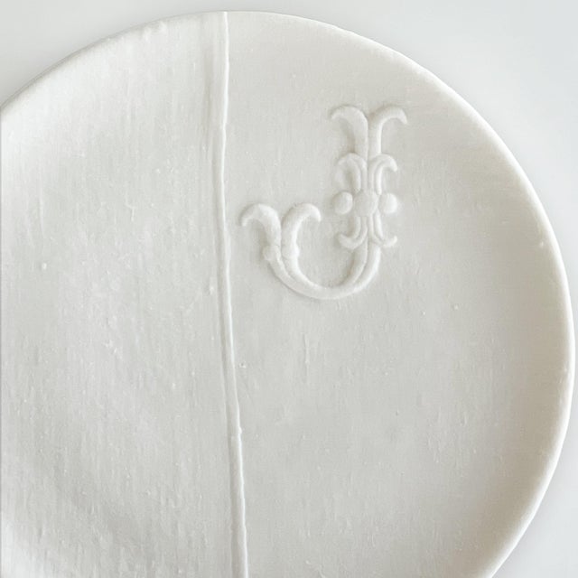 This item belongs to our "Soft Porcelain" series. The Soft Porcelain series is an ode to textile traditions: monograms,...