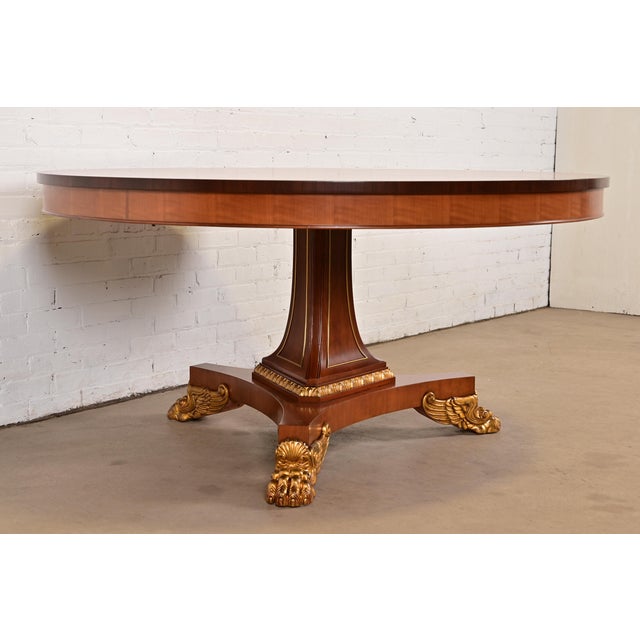 Baker Furniture Company 1980s Baker Furniture Regency Cherry Wood and Parcel Gilt Paw Foot Pedestal Extension Dining Table, Newly Refinished For Sale - Image 4 of 14