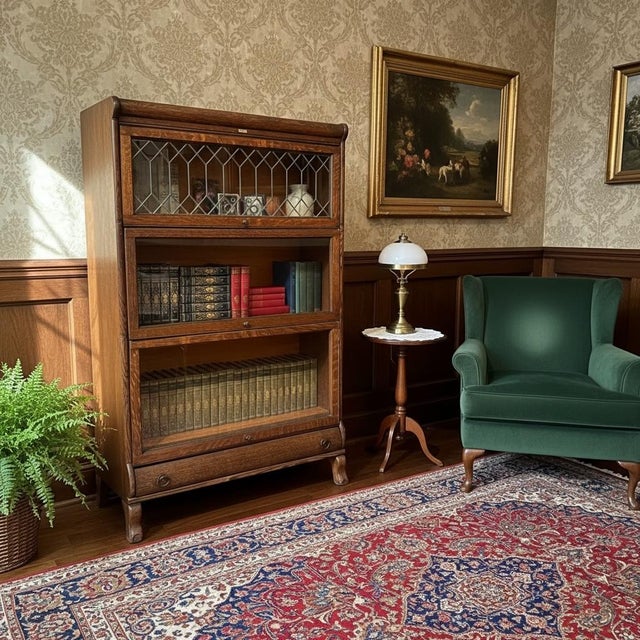 Up for sale is a beautiful, early 20th-century modular barrister bookcase manufactured by the C.J. Lundstrom Manufacturing...