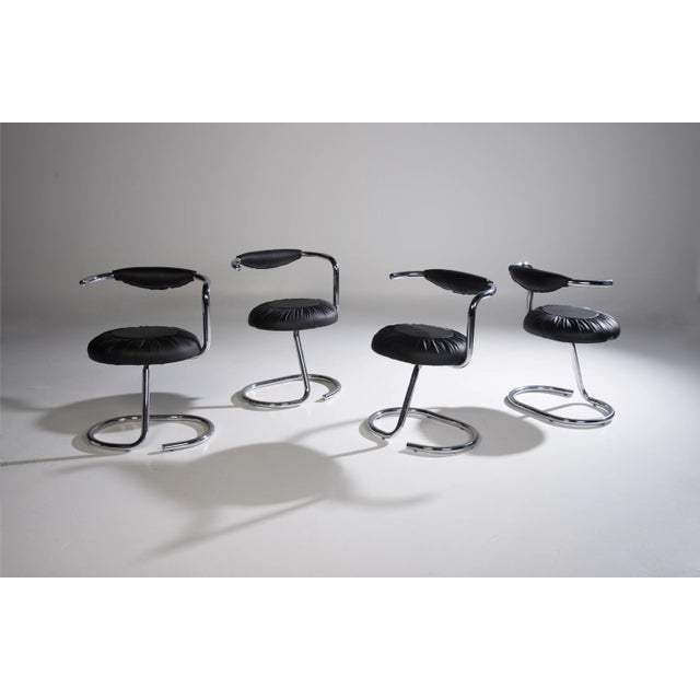 Black Cobra Chairs by Giotto Stoppino, Italy, 1970s, Set of 4, in Restored conditions. Designed 1970 to 1979 This piece is...