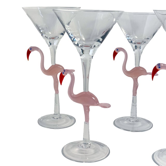 A wonderfully whimsical set of six vintage hand-blown martini glasses, each featuring an applied pink flamingo...