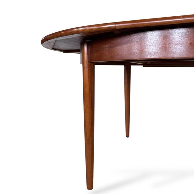 Mid-Century Extending Teak Dining Table Round to Oval Butterfly Leaf Table from Elliotts of Newbury, 1960s For Sale - Image 9 of 11