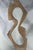 Carved pine abstract figural sculpture titled "Thin Figure" created in 1965 by Herbert Simon. Signed by the artist. A rare...