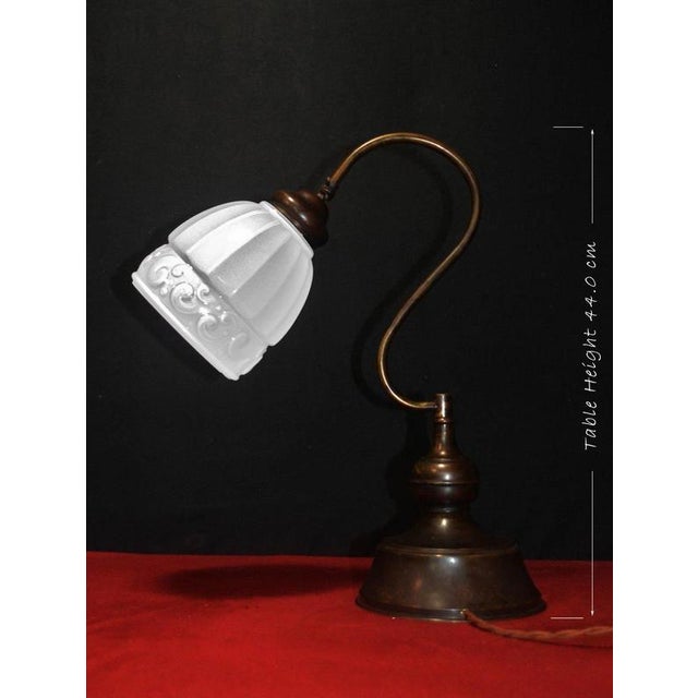 A handsome French Art Deco adjustable table lamp dating to circa 1930, combining substantial period metalwork with a hand-...