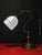 A handsome French Art Deco adjustable table lamp dating to circa 1930, combining substantial period metalwork with a hand-...