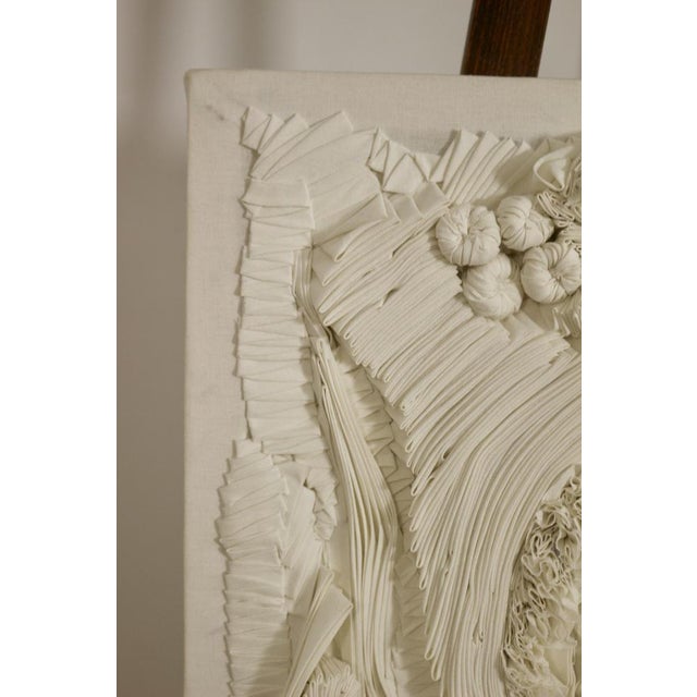Transforming simple raw cotton into abstract works evoking natural landscapes is fascinating. I use pleating, folding,...