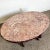 Elevate your living space with this exquisite Chinese Rosewood Hand Carved Pink Marble Top Oval Coffee Table. This...