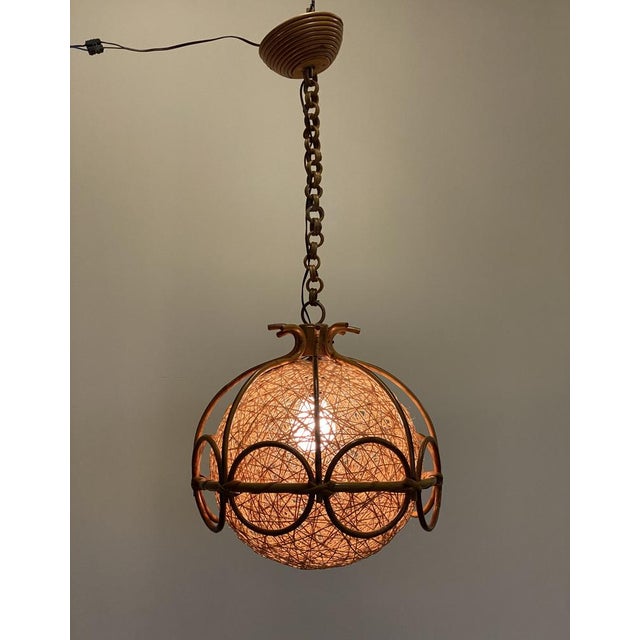 70s lantern in bamboo and rope Up to 250V (Europe/UK Standard).The wiring of this item may be original and might need...