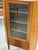 Danish Modern Corner Cabinet or Bar with glass doors. Shelves are not adjustable. 35w 22.5d 57.5h