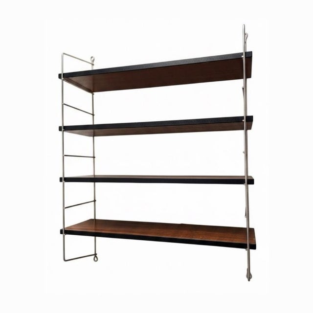Vintage modular wall shelf, designed in the 1970s and inspired by minimalist scandinavian design of the 1960s and the...
