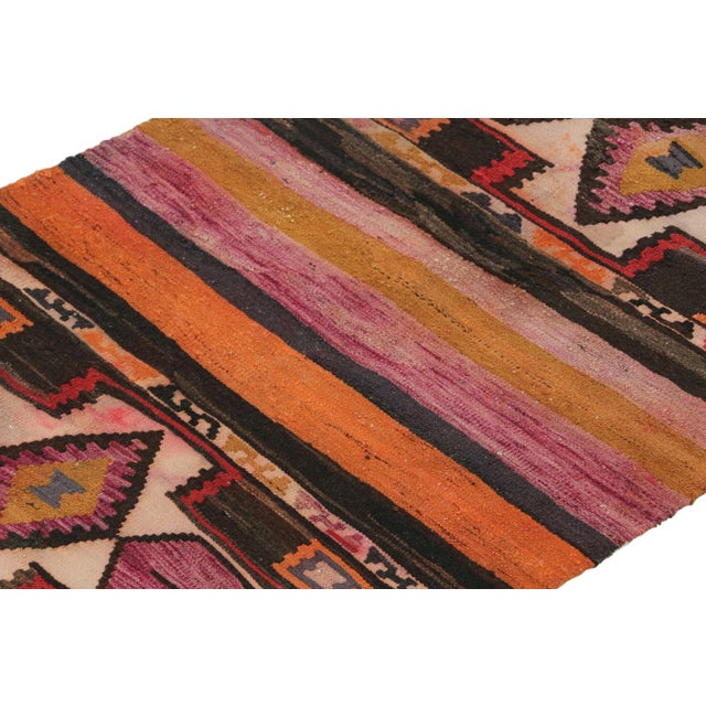 This vintage 3x4 Persian Kilim is a unique tribal rug for its period. Handwoven in wool in the mid-century, circa...