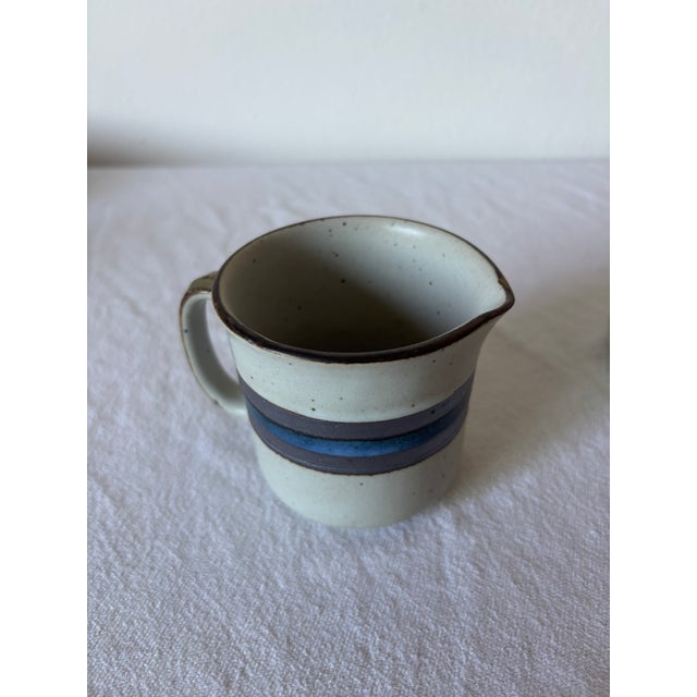 Beautiful brutalist "Horizon" creamer and covered sugar bowl from the 1970's. These are oven and dishwasher safe which is...