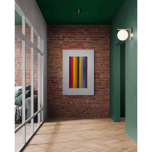 Add a pop of color to your space with this mixed media piece featuring uniform bars of saturated color. Made with a color...