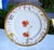 Four (4) antique hand‑painted porcelain plates by Fischer & Mieg / Pirkenhammer, from the late 19th–early 20th century....