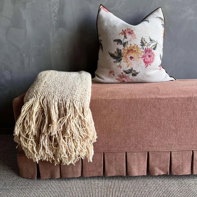 Introducing the April slip covered bench, featuring elegant white oak legs and a slip cover with a wide pleated skirt made...