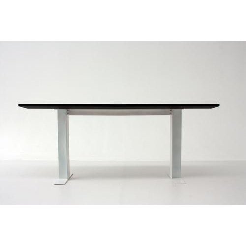 Spitfire matt dark ebony top and matt white structure desk by casa casati dimensions: d 50 x w 180 x h 74 cm. Materials:...
