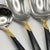 Art Deco Late 20th Century Yamazaki "Lindi" Gold Accent Black Handle Stainless Complete 7-Piece Hostess Set (Gerald Patrick 18/8) For Sale - Image 3 of 17