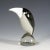 A sculpture of a stylized grosbeak in smoke grey and opaque glass. Hand made in the gral glass manufactory, germany....