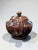 This Vintage Japanese Moriage Hand-Painted Redware Teapot is a stunning example of traditional Japanese ceramic artistry....