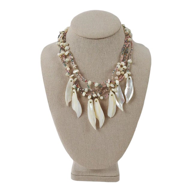 1990's one of a kind artist studio made beaded necklace using mother of pearl and light blue and pink seed beads. By Linda...