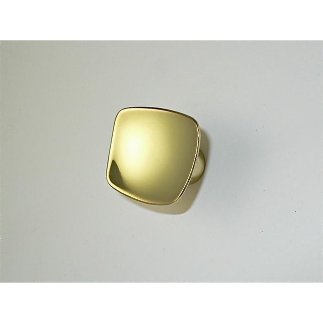 1950's - 1960's vintage, mid-century modern, die-cast cabinet knob in a polished brass finish; 1 1/2" W x 1 1/4" H, with...