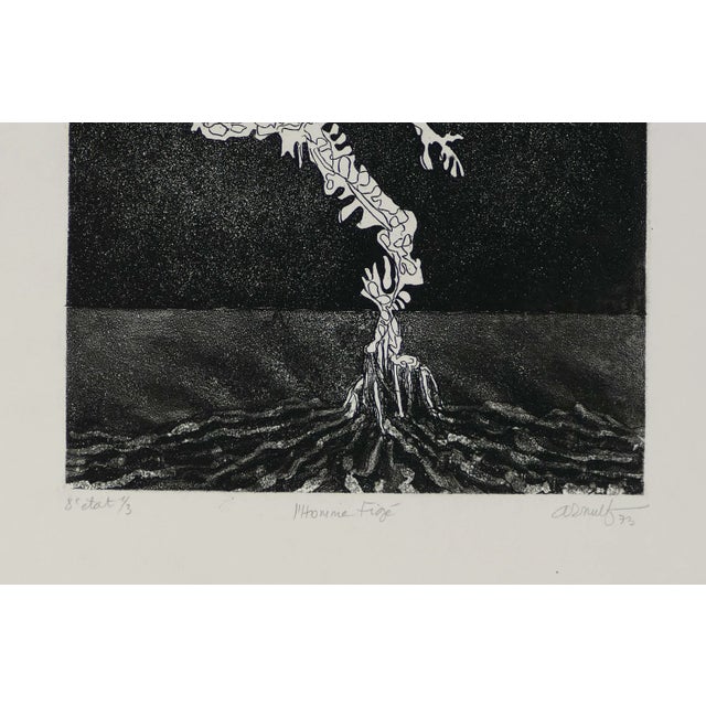 Image dimensions: 25 x 20.6 cm. L'Homme Figé is an original artwork realized by Georges Arnulf in 1973. Original black and...