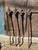 Set of 4 antique fence posts with substantial fleur-de-lis type finials used as plant supports or garden / interior decor....