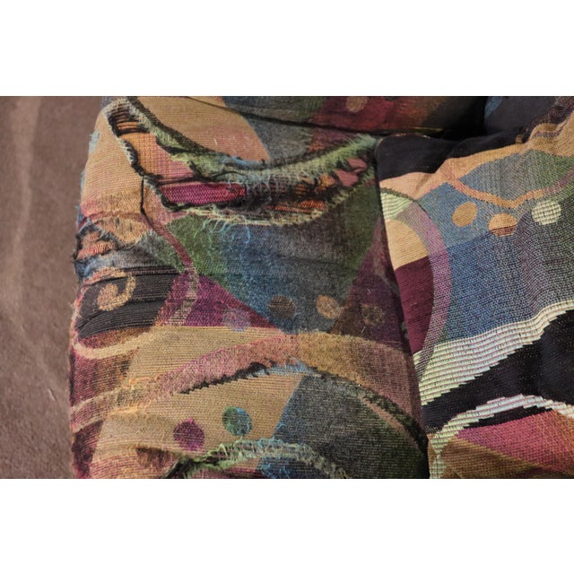 Mid-century modern lounge chairs with wild sculpting shape. Funky 1960s style form for home or office.