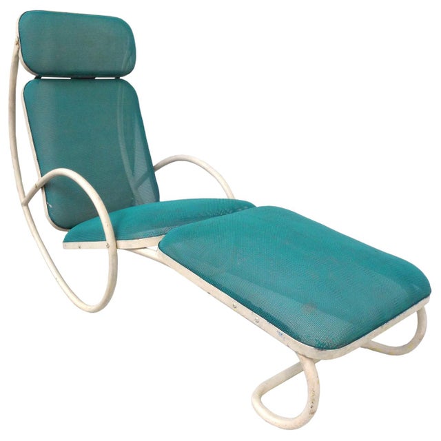 A wonderful outdoor chaise lounge with white, tubular steel frame and a sea blue/green seat. Great scale and modernist...