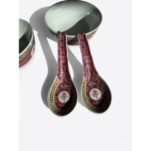 Elevate your tablescape or Chinoiserie collection with this vibrant four-piece porcelain set in the classic Mun Shou...