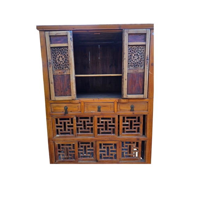 This antique Asian cabinet is a beautiful and functional Chinoiserie piece that brings Asian charm to any space. It...