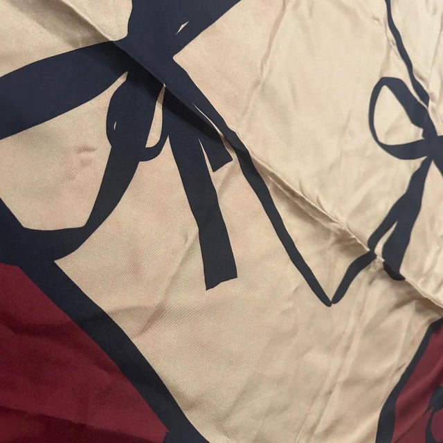 This is a beautiful, classic Valentino silk scarf dating from the 1990s, a period when the brand, under founder Valentino...