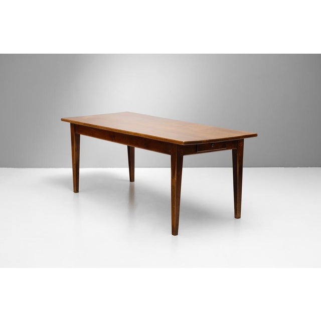 French cherrywood farmhouse table on tapered legs, France circa 1880.