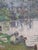 Early 20th century Impressionist oil on canvas of washerwomen by a river by Stanley. The painting is signed and dated...