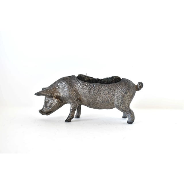 An antique figurative pig pen wipe, c. 1890s when novelty pen wipe animals were popular. Cold-painted metal (possibly...