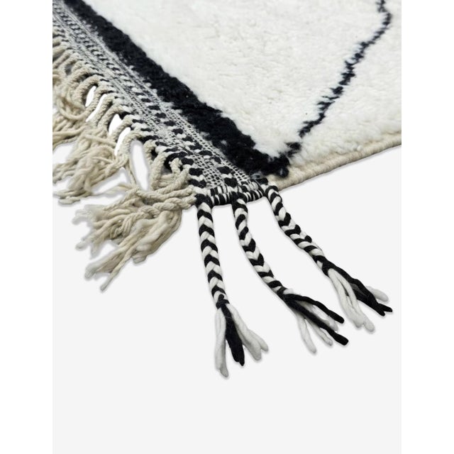 Beni Ourain Rug | Handwoven Berber Wool Rug with Classic Diamond Lattice This classic Beni Ourain rug features a plush...
