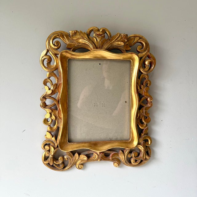 Vintage gilt gold leaf faux bois picture frame with glass cover. Beautifully ornate, the designs are elegant.