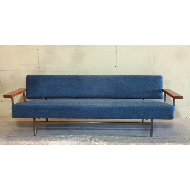 The Gelderland 3-seater sofa by Rob Parry can be transformed into a daybed; this conversion is achieved by pulling the...