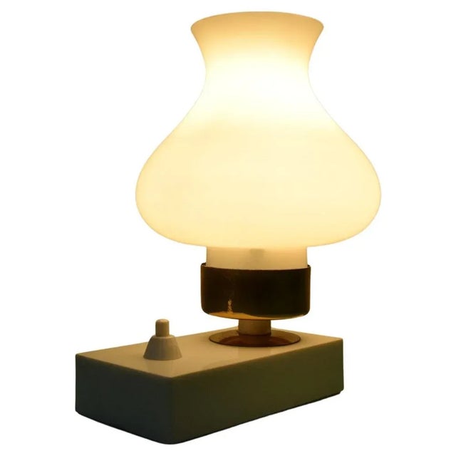 Made in czechoslovakia. Made of plastic, glass, brass 1x e14 or e15 bulb. Re-polished. Fully functional. Good original...