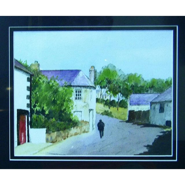 Lovely little original watercolor by Irish Artist – M.MacLoughlin. Village scene with red door………………..hence we call it...