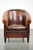 Beautiful and characterful sheepskin club armchair with lovely deep warm colors, black piping, and a comfortable seat. :...