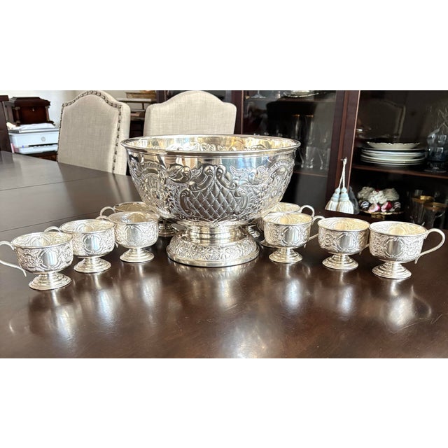 Beautiful 1920’s Sheffield England Hand Chased Repousse Punch bowl w/12 cups. Shield and diamond design . 12”x12”x8”