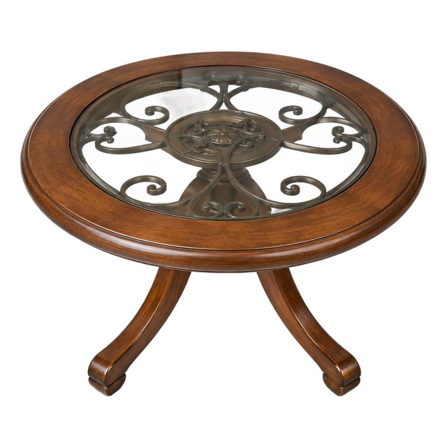 Elegant Glass Top Coffee Table With Wrought Iron Detail For Sale