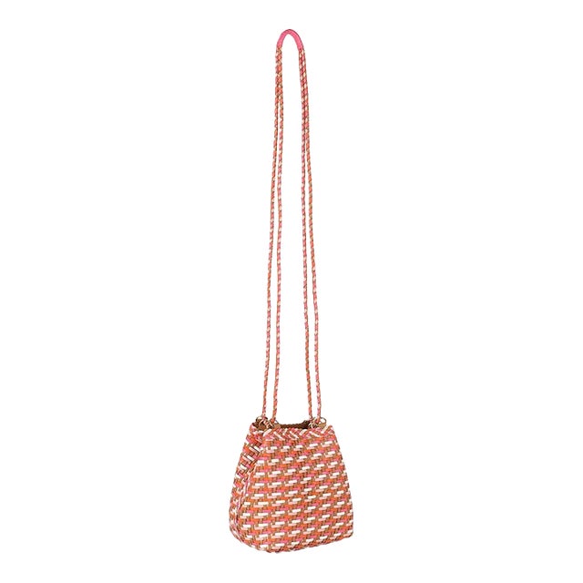 Small bucket crossbody in handwoven cognac / white / orange / pink leather. Fully lined with woven leather shoulder straps...