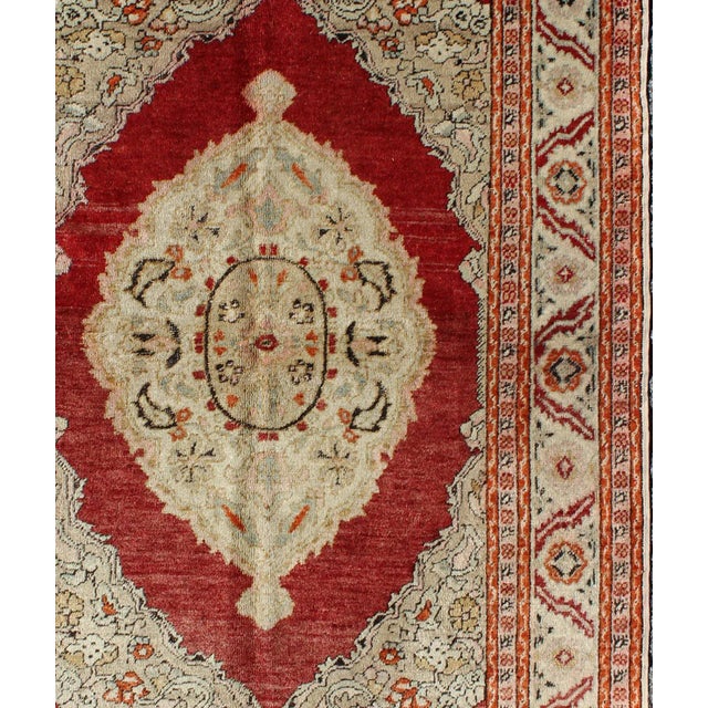 Antique Oushak Rug with Floral Medallion in Light Green, Ivory, Taupe & Red. Floral medallion Antique Oushak Rug with...
