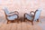 This pair of armchairs is a truly magnificent and refined showcase of high-end bourgeois furniture from the early...