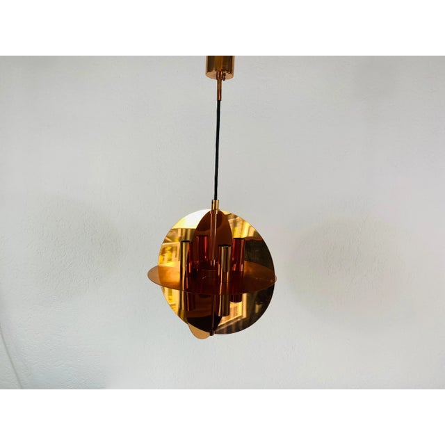Extraordinary copper pendant lamp by Cosack in the 1970s. Measures: Height of shade 34 cm Max height 65 cm Diameter 27 cm...