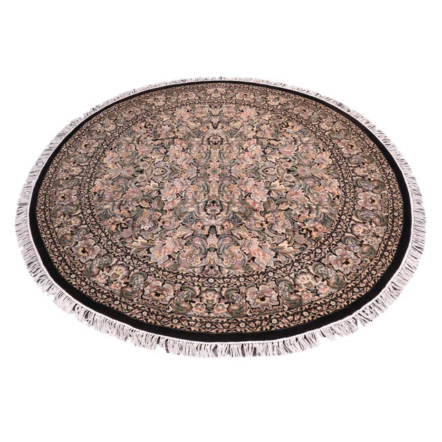 This hand‑knotted Pak Persian round rug showcases the finest expression of traditional Persian artistry. Each piece is...
