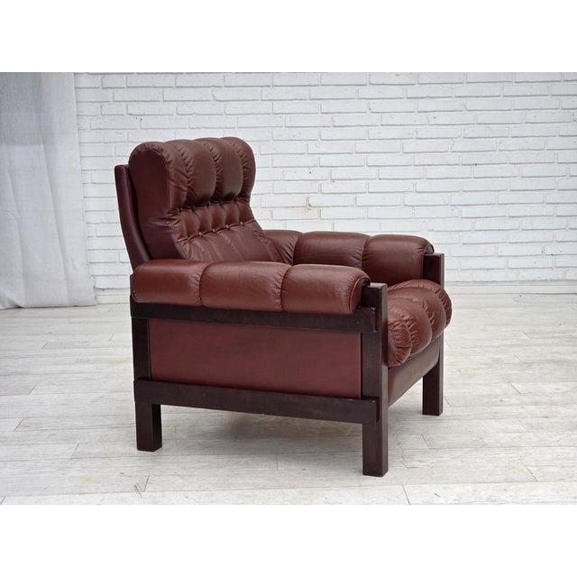 1970s, Scandinavian armchair. Original brown furniture leather, dark beech wood. Original very good condition: no smells,...