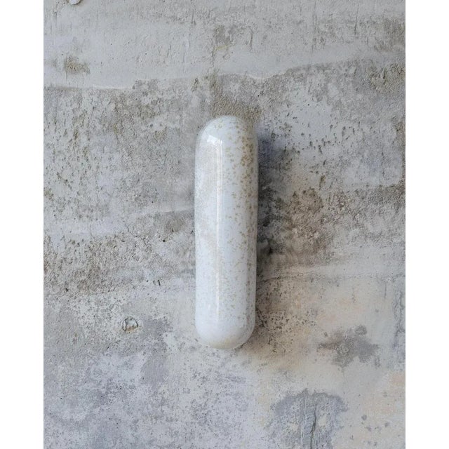 Pearl Small Kyrtos Wall Light by Lisa Allegra Dimensions: Ø 8 x H 30 cm. Materials: Ceramic. Up to 250V (Europe/UK Standard).